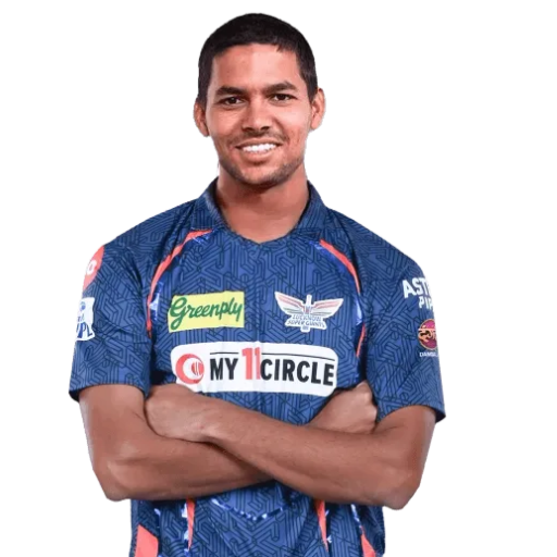 Akash Singh posing in lucknow super giants jersey