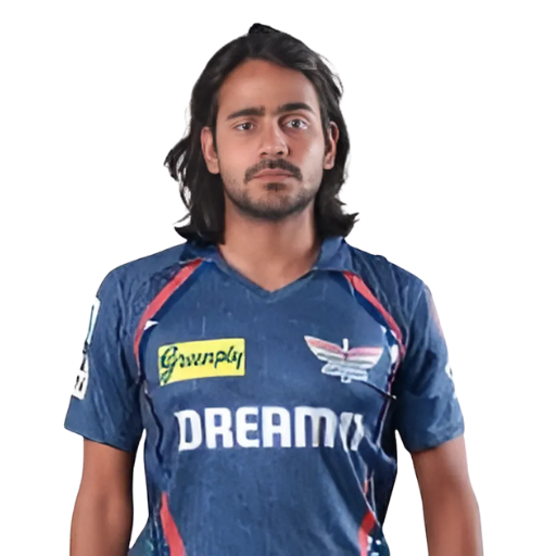 Digvesh Rathi posing in lucknow super giants jersey
