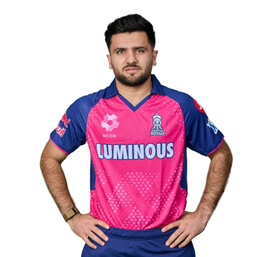 Fazalhaq Farooqi posing in Rajasthan Royals jersey 2025
