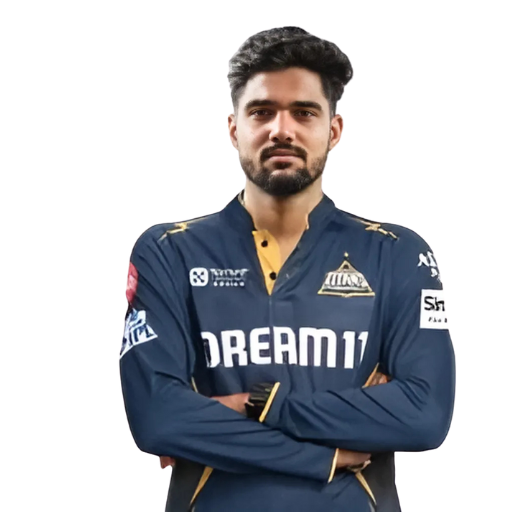 Gurnoor Singh Brar posing in gujarat titans jersey