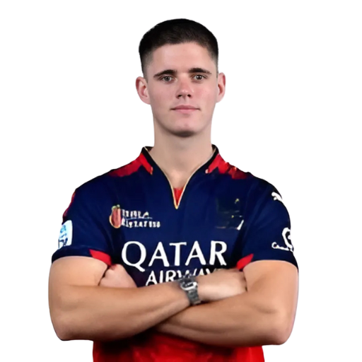 Jacob Bethell posing in Royal Challengers Bengaluru jersey 2025