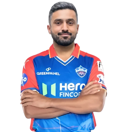 Karun Nair posing in delhi capitals kit