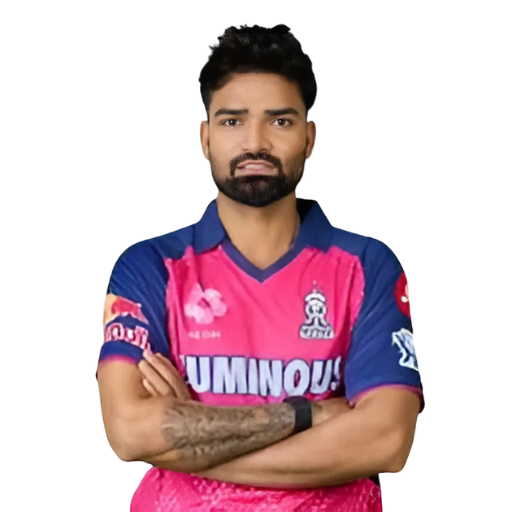 Kumar Kartikeya posing in Rajasthan Royals jersey 2025