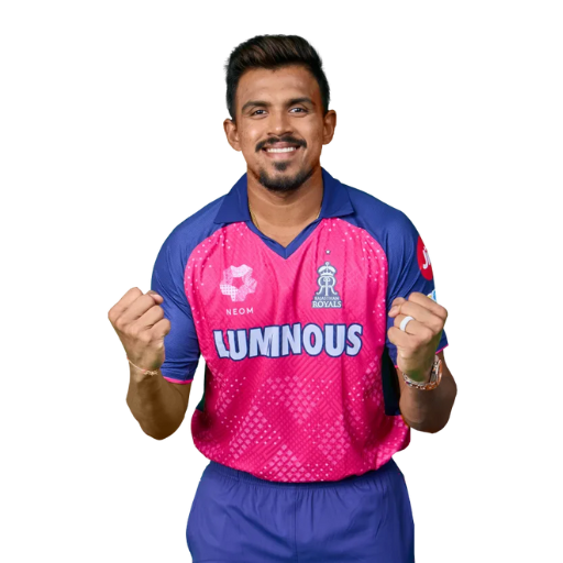 Maheesh Theekshana posing in Rajasthan Royals jersey 2025