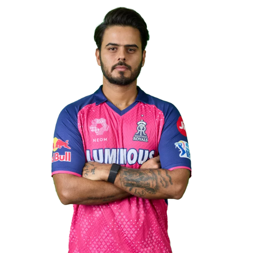 Nitish Rana posing in Rajasthan Royals jersey 2025