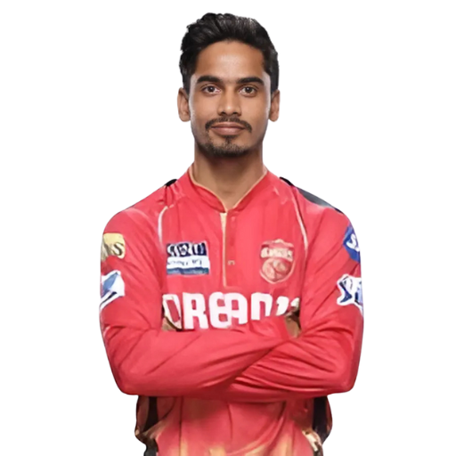 Praveen Dubey posing in punjab kings jersey 2025