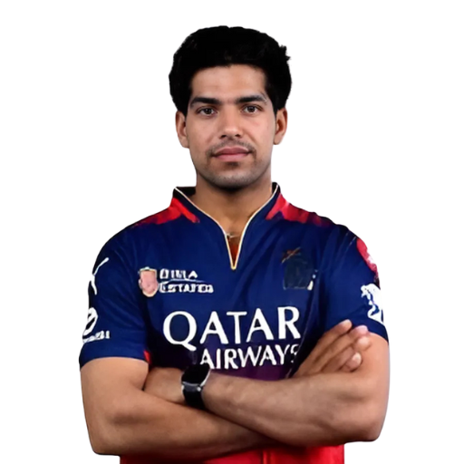 Swastik Chikara posing in Royal Challengers Bengaluru jersey 2025
