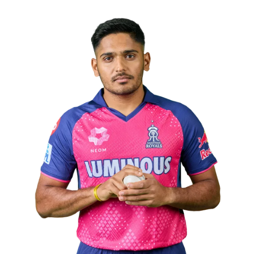 Tushar Deshpande posing in Rajasthan Royals jersey 2025